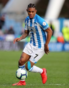 Juninho Bacuna has hinted that he could stay at Huddersfield this summer after he spoke about making a promotion push next season.