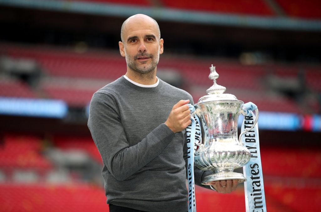 Pep Guardiola believes Manchester City is 'the perfect place to work' and says he will be at the Etihad Stadium for at least the next two seasons.