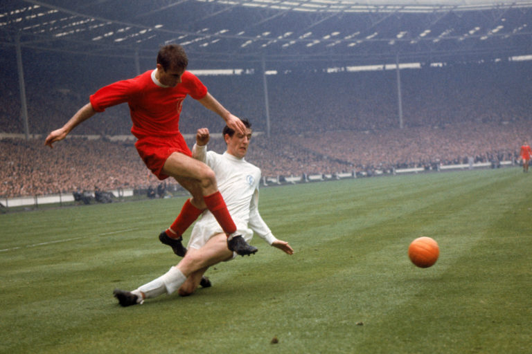 Hunter, right, challenges Roger Hunt for the ball during the 1965 FA Cup final at Wembley 
