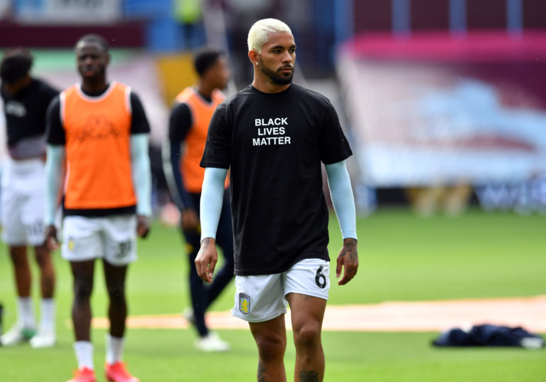 Players warmed up in Black Lives Matter t-shirts