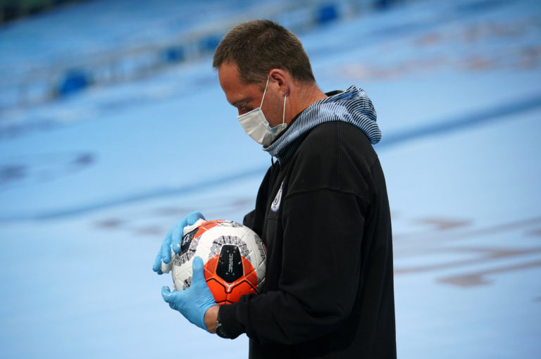 A match ball is wiped during the game