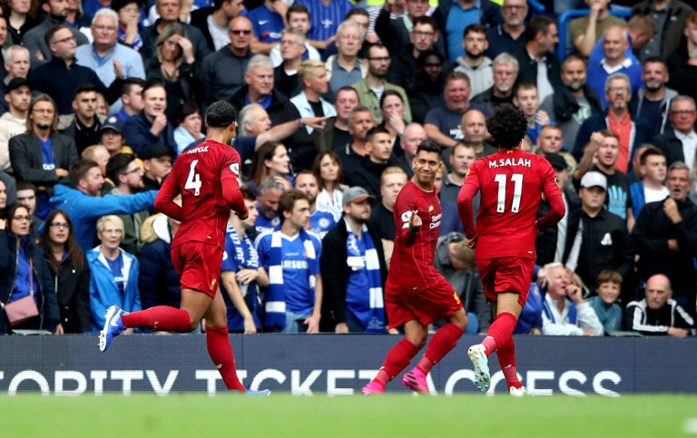 Roberto Firmino, second right, celebrates scoring Liverpool's second goal during the 2-1 win over Chelsea in September. Victory at Stamford Bridge extended the Reds' unbeaten start to six top-flight games while inflicting a first Premier League loss on Blues boss Frank Lampard
