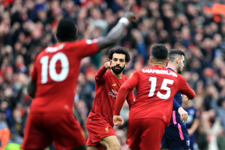 Mohamed Salah, centre, celebrates his 70th Premier League goal for Liverpool on his 100th top-flight appearance for the club during March's 2-1 win over Bournemouth. His low strike made him the first Reds player since Michael Owen in 2002-03 to score 20-plus goals in all competitions in three successive seasons