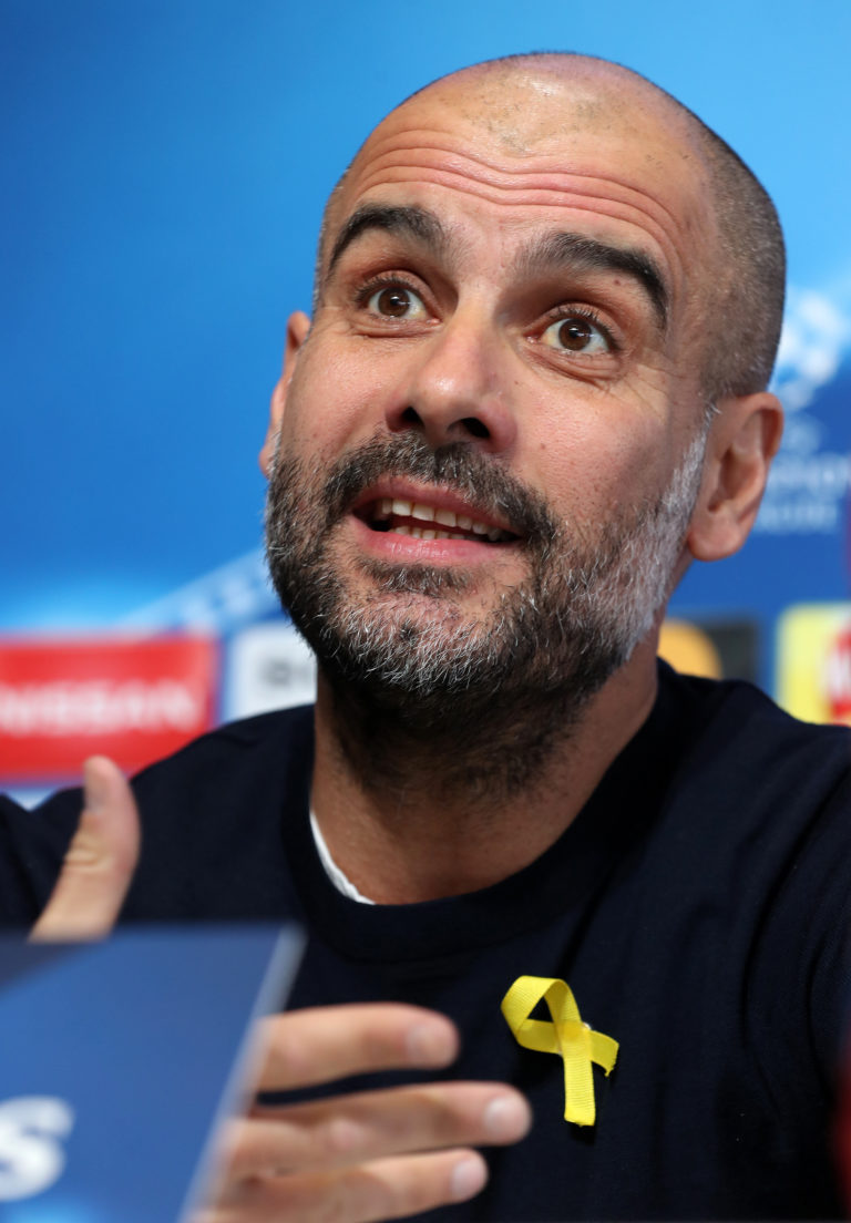 Pep Guardiola wearing a yellow ribbon in support of Catalan independence
