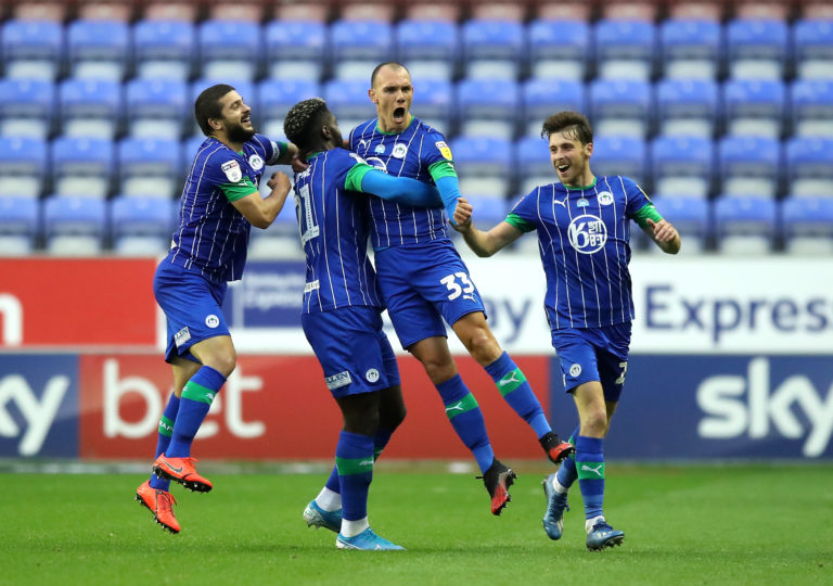 Kal Naismith (second right) netted a brace for Wigan  (Martin Rickett/PA).