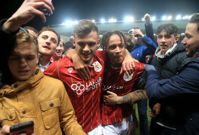 Bristol City's Jamie Paterson (left) and Bobby Reid celebrate after the win against Manchester United 