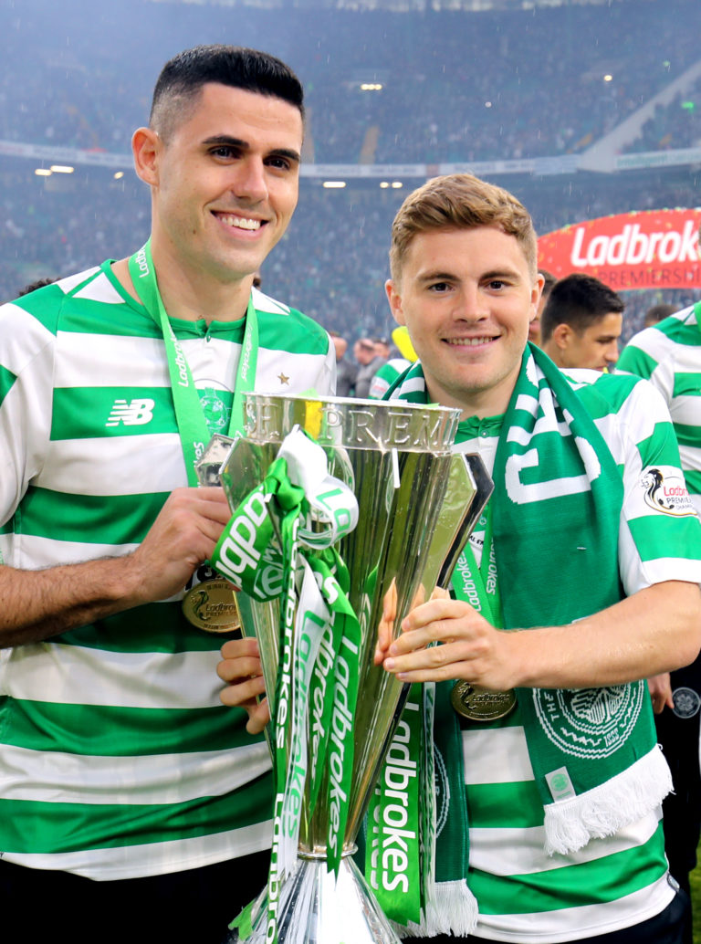 Forrest (right) has won nine league titles with Celtic