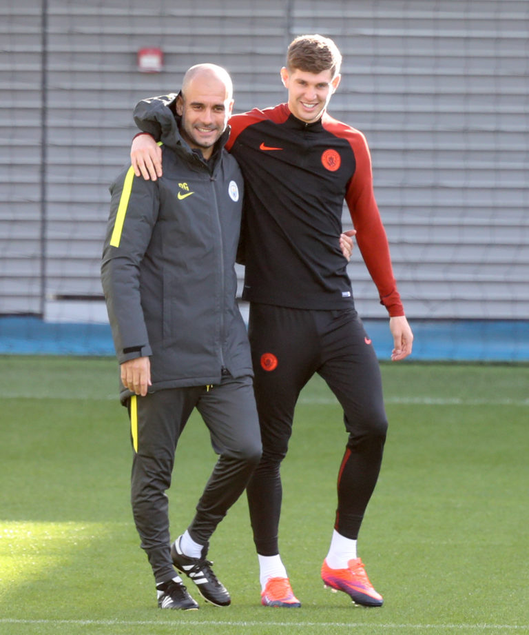 Guardiola (left) continues to rate Stones (right) very highly