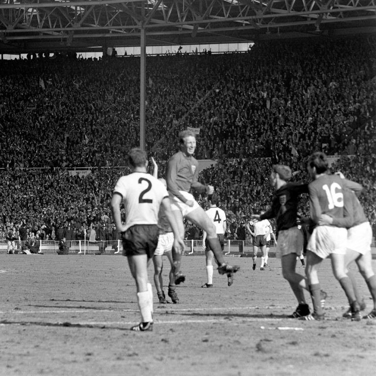 Jack Charlton leaps in the air as he celebrates England's World Cup win