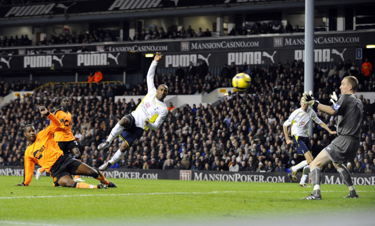 Jermain Defoe, centre, scores Tottenham's second goal against Wigan
