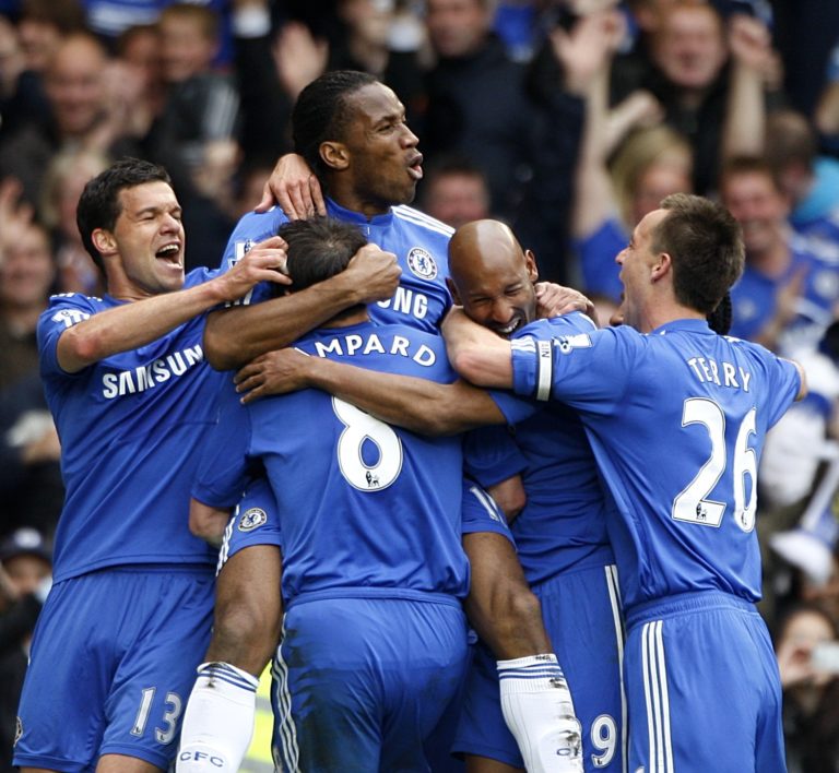 Didier Drogba, second left, scored a hat-trick as Chelsea clinched the title in style against Wigan