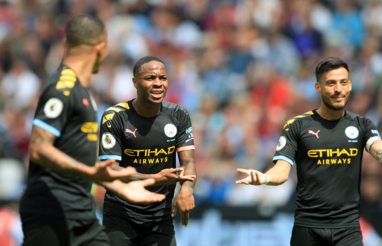 Raheem Sterling, centre, leads the protestations after VAR made its mark in the Premier League for the first time. Sterling's hat-trick helped get the reigning champions' title defence off to a flying start in a 5-0 success at West Ham but City were denied another goal when, on review, he was ruled offside by a matter of millimetres having assisted fellow forward Gabriel Jesus, left