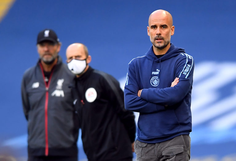Masked fourth official Mike Dean, centre, peers past Pep Guardiola during Manchester City's thrashing of champions Liverpool. City gave Jurgen Klopp's Reds a belated reminder of their power as they thrashed their newly-crowned successors 4-0 at the Etihad Stadium in early July